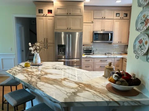 Updated kitchen with shaker cabinets and tile backsplash
