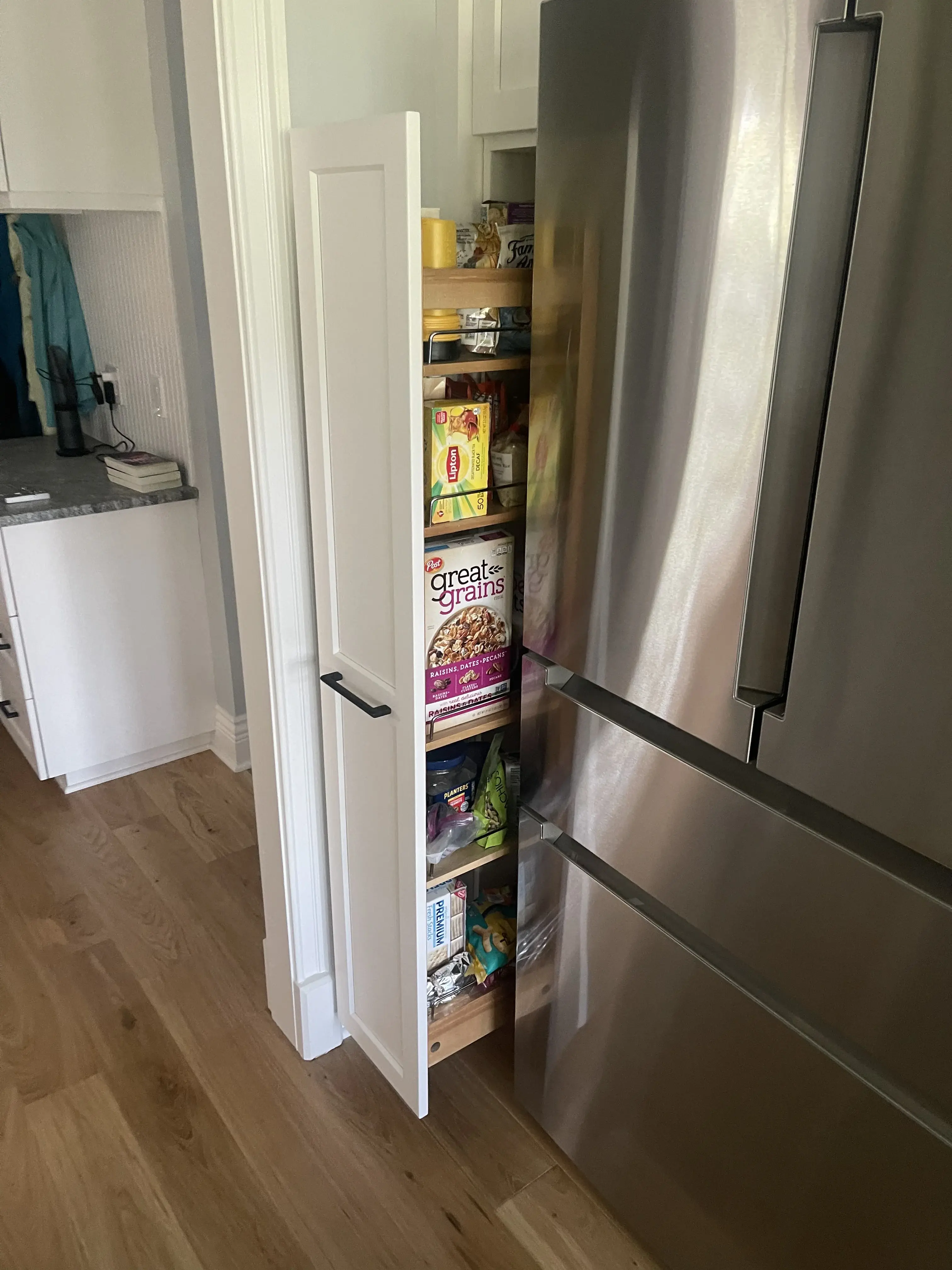 Pull-out pantry cabinet showcasing organized storage